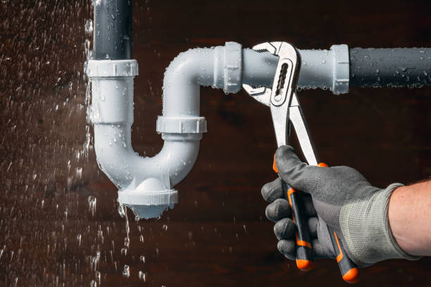Professional Emergency Plumber technician working in Fenton, MI